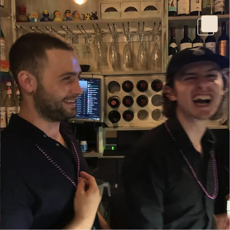 Smokestack cocktail bar staff laughing